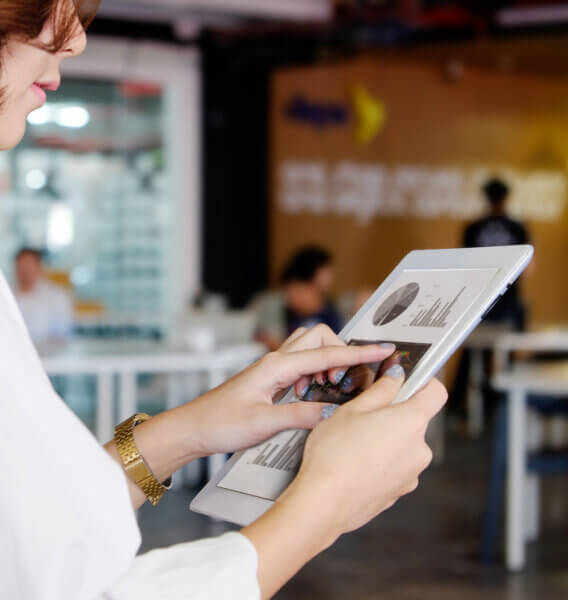 woman looking at Capital Asset Inventory on tablet